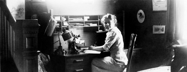 Nancy Russell at her desk.