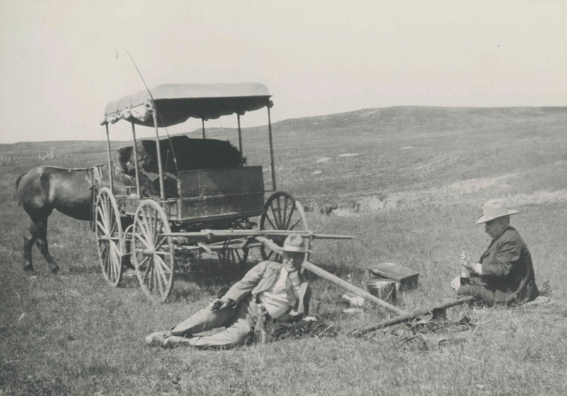C. B. Power (seated on left) and G. R. Norris, PN Ranch, Crooked Creek.