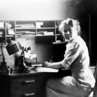 Nancy Russell at her desk.