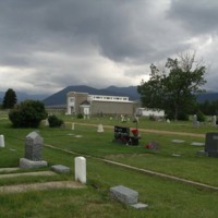 View of Red Lodge Cemetery with mausoleum in distance