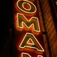 Roman Theater sign at night